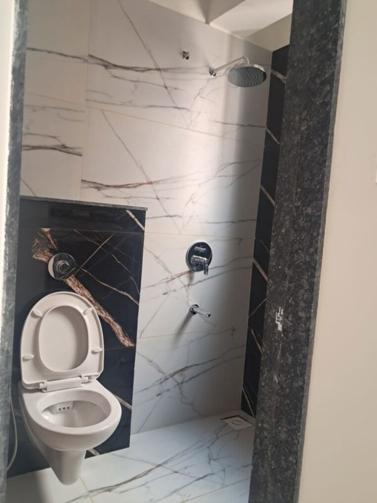 Bathroom, kolte-patil-western-avenue 2 Bedroom 850 Sq.Ft. Apartment In Wakad Pune 9786623