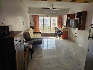 Living Room in 2 BHK Apartment at Om Viraj Apartment, Andheri West – for Rent