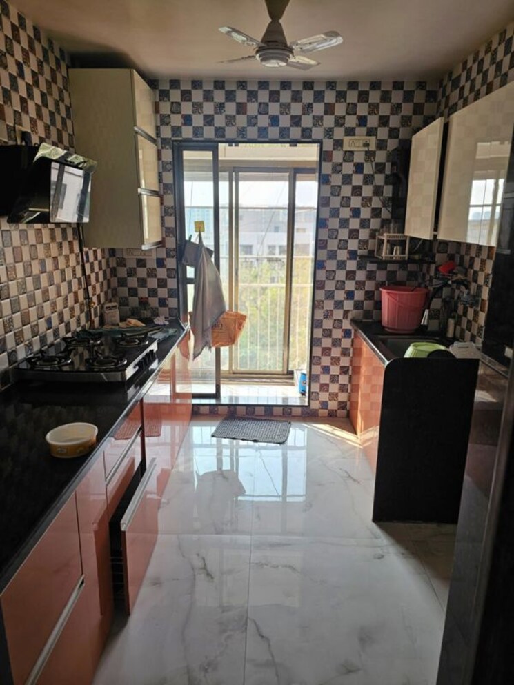 Kitchen, om-viraj-apartment 2 Bedroom 900 Sq.Ft. Apartment In Andheri West Mumbai 9703137