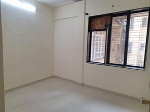 Room in 2 BHK Apartment at Khar West – for Rent