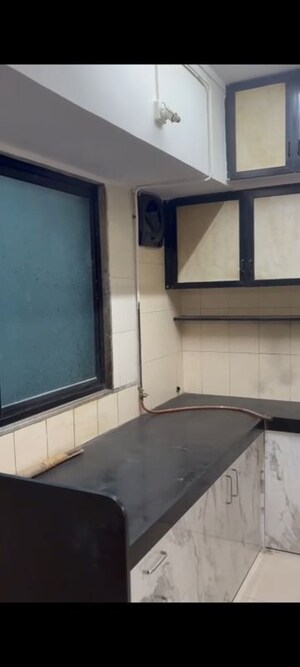 Kitchen in 1.5 BHK Apartment at Vile Parle East – for Rent
