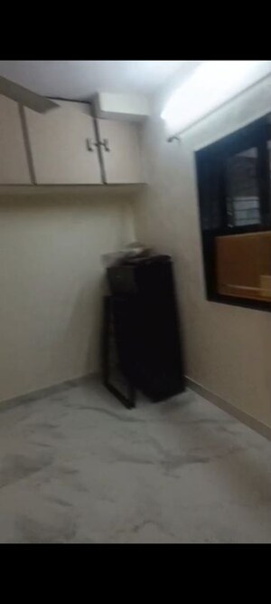 Living Room in 1 BHK Apartment at Vile Parle East – for Rent