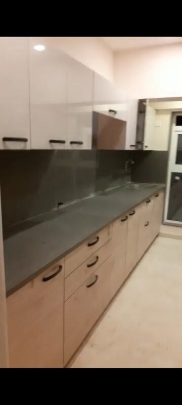 Kitchen in 2 BHK Apartment at Rushi The Kollage, Andheri East – for Rent