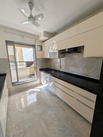Kitchen in 3 BHK Apartment at Neelkanth Greens, Manpada – for Rent