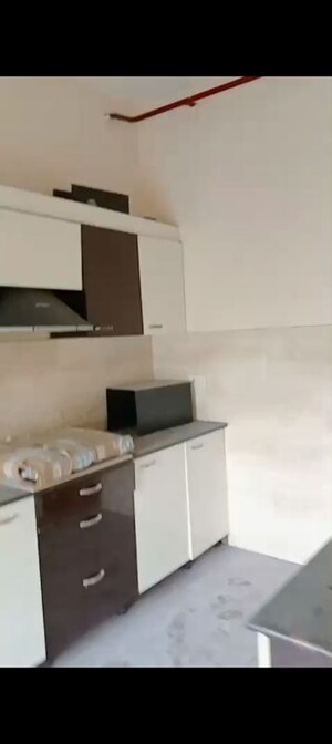 Kitchen in 3.5 BHK Apartment at Ansals Celebrity Greens, Sushant Golf City – for Rent