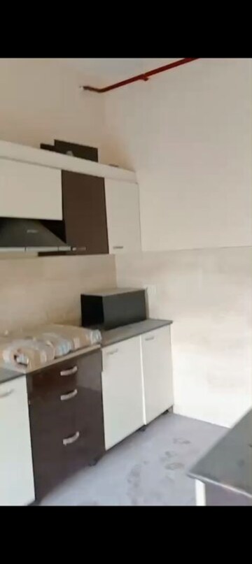 Kitchen in 3.5 BHK Apartment at Ansals Celebrity Greens, Sushant Golf City – for Rent