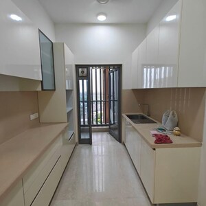 Living Room in 4 BHK Apartment at Rustomjee Crown, Gokhale Road – for Rent