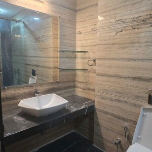 Bathroom in 4 BHK Apartment at Omkar 1973, Century Bazar – for Rent