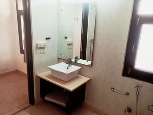 Bathroom in 4 BHK Builder Floor at Defence Colony – for Rent