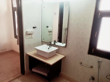 Bathroom in 4 BHK Builder Floor at Defence Colony – for Rent