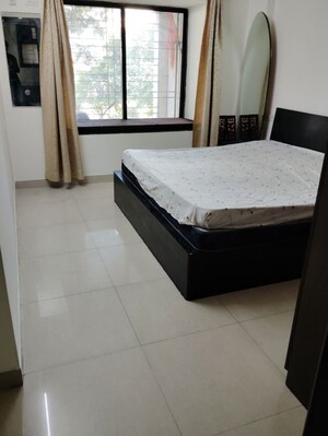 Bedroom in 2 BHK Apartment at Bramha Suncity, Wadgaon Sheri – for Rent