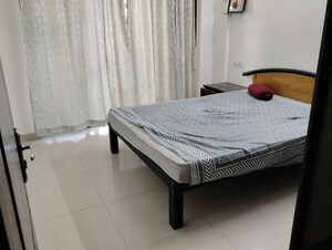 Bedroom in 2 BHK Apartment at Bramha Suncity, Wadgaon Sheri – for Rent