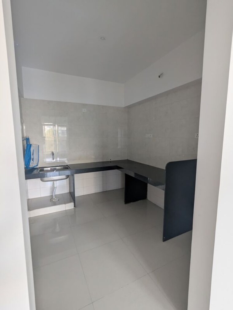 Kitchen, rama-paradise-one 2 Bedroom 700 Sq.Ft. Apartment In Chikhali Pune 9787248