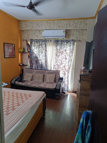 Living Room in 2 BHK Apartment at Antriksh Golf View, Sector 78 – for Rent