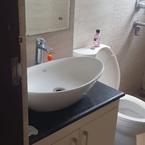 Bathroom in 1 BHK Apartment at Barnala Green Lotus Avenue, Nagla Road – for Rent
