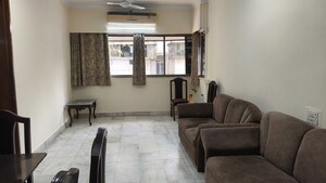 Living Room in 2 BHK Apartment at Miramar CHS, Dadar West – for Rent