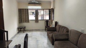 Living Room in 2 BHK Apartment at Miramar CHS, Dadar West – for Rent