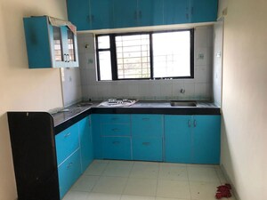 Kitchen in 1 BHK Apartment at Radhakrishna Township, Sinhagad Road – for Rent