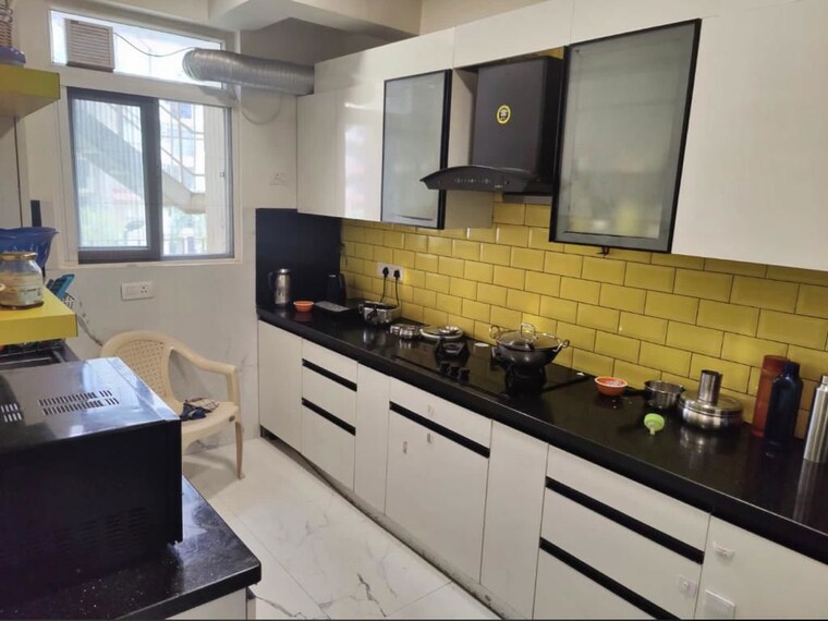 Kitchen, emaar-emerald-floors-premier 3 Bedroom 1600 Sq.Ft. Apartment In Sector 65 Gurgaon 9787338