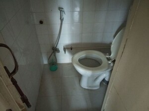 Bathroom in 2 BHK Apartment at Amey River View , Anand Nagar – for Rent