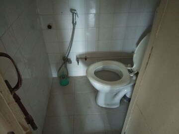 Bathroom in 2 BHK Apartment at Amey River View , Anand Nagar – for Rent