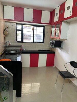 Kitchen in 2 BHK Apartment at Amey River View , Anand Nagar – for Rent