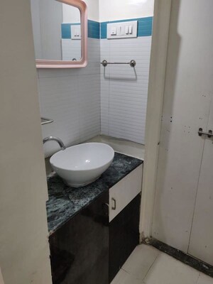 Bathroom in 2 BHK Apartment at Amey River View , Anand Nagar – for Rent