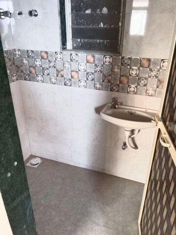 Bathroom in 1 BHK Apartment at Omkar Belleza, Dadar West – for Rent
