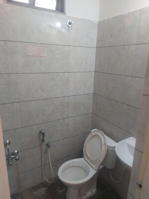 Bathroom in 2 BHK Apartment at Shree Radha Jaldeep Icon, Makarba – for Rent