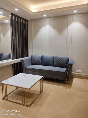 Living Room in Studio Apartment at DLF Cyber Park, Sector 20 – for Rent