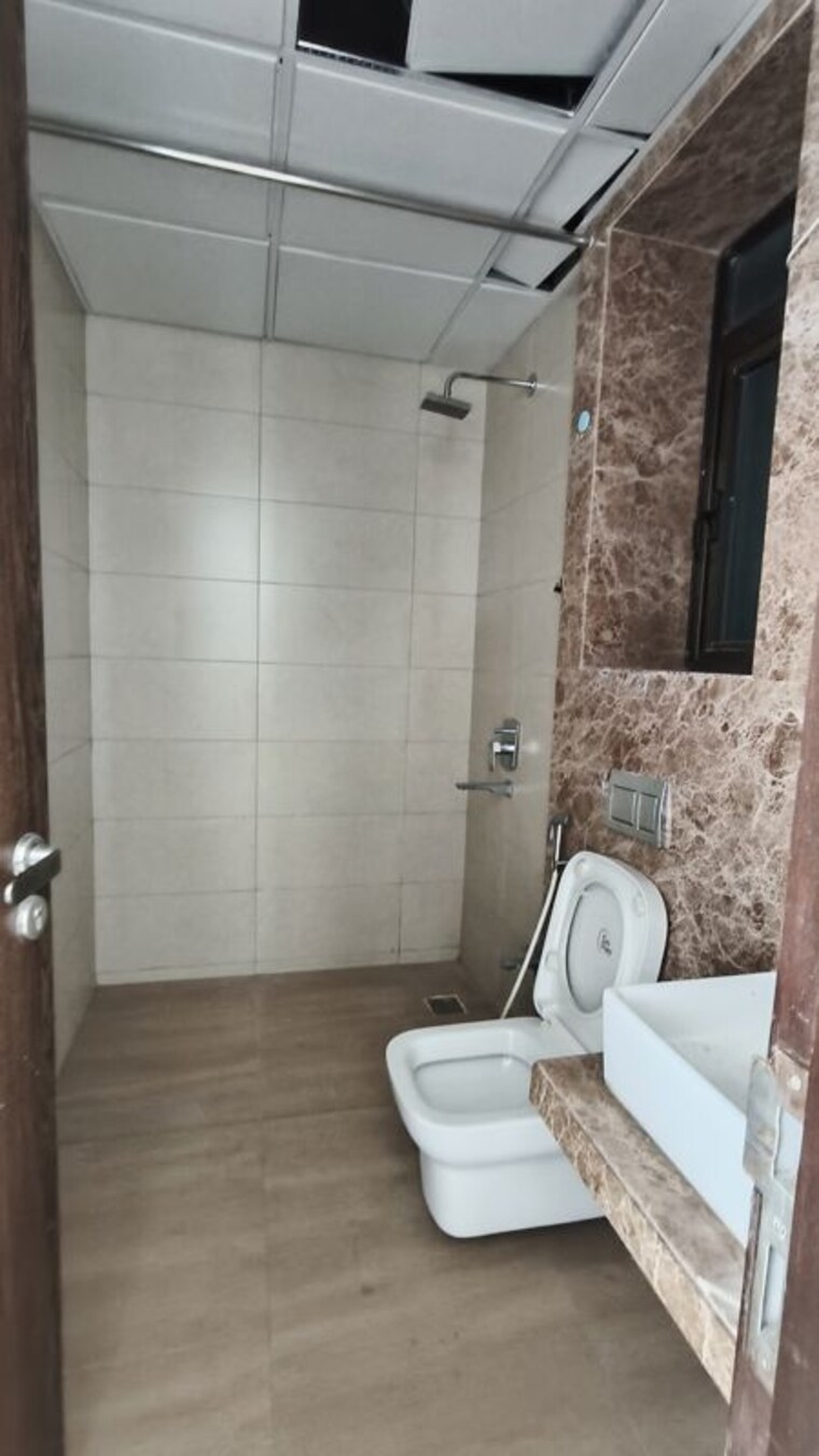 Bathroom, peninsula-celestia-spaces 2 Bedroom 840 Sq.Ft. Apartment In Parel Mumbai 9787548