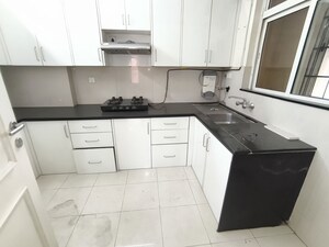 Kitchen in 3 BHK Apartment at Hiranandani Estate, Ghodbunder Road – for Rent