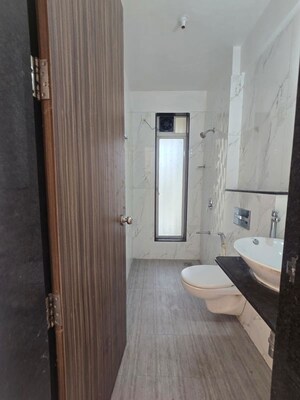 Bathroom in 3 BHK Apartment at Vasant Fiona, Pokhran Road No Two – for Rent
