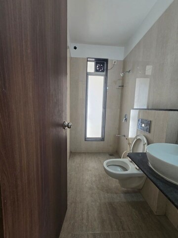 Bathroom in 3 BHK Apartment at Vasant Fiona, Pokhran Road No Two – for Rent