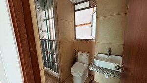 Bathroom in 1 BHK Apartment at Kalpataru Immensa, Kolshet Road – for Rent
