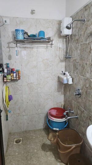 Bathroom in 1 BHK Apartment at Puranik Hometown, Ghodbunder Road – for Rent
