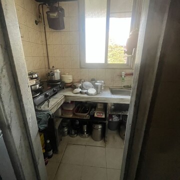 Kitchen in 1 BHK Apartment at Vas Pushpa Park, Vivekanand Nagar – for Sale