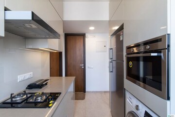 Kitchen in 1 BHK Apartment at Hiranandani Zen Maple, Powai – for Rent