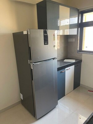 Kitchen in 2 BHK Apartment at Raunak Unnathi Greens, Kasarvadavali – for Rent