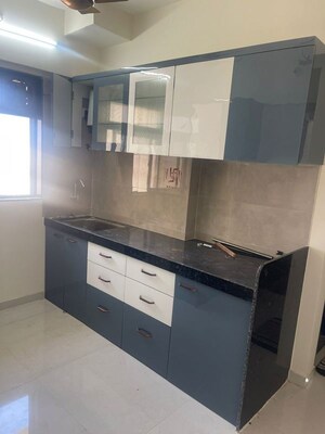 Kitchen in 2 BHK Apartment at Raunak Unnathi Greens, Kasarvadavali – for Rent