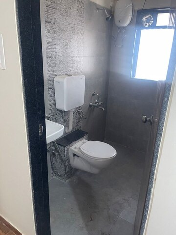 Bathroom in 2 BHK Apartment at Raunak Unnathi Greens, Kasarvadavali – for Rent