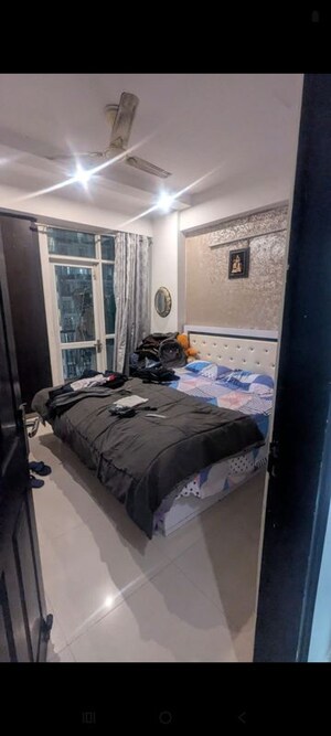 Bedroom in 3 BHK Apartment at Prateek Wisteria, Sector 77 – for Rent