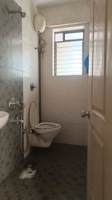 Bathroom in 3 BHK Apartment at Swaraj Planet, Kopar Khairane – for Rent