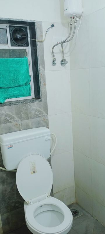 Bathroom in 2 BHK Apartment at Bindra Complex, Andheri East – for Rent