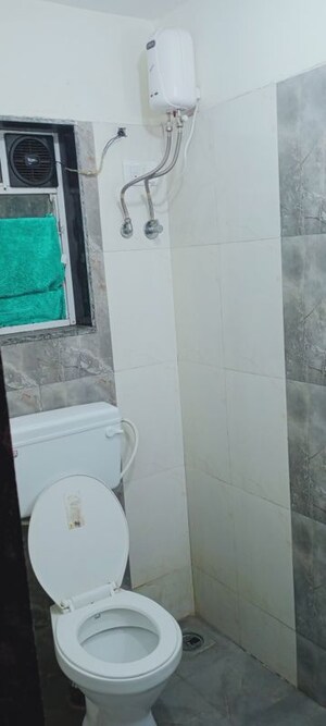 Bathroom in 2 BHK Apartment at Bindra Complex, Andheri East – for Rent