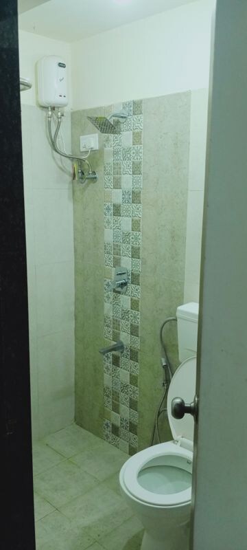 Bathroom in 2 BHK Apartment at Bindra Complex, Andheri East – for Rent