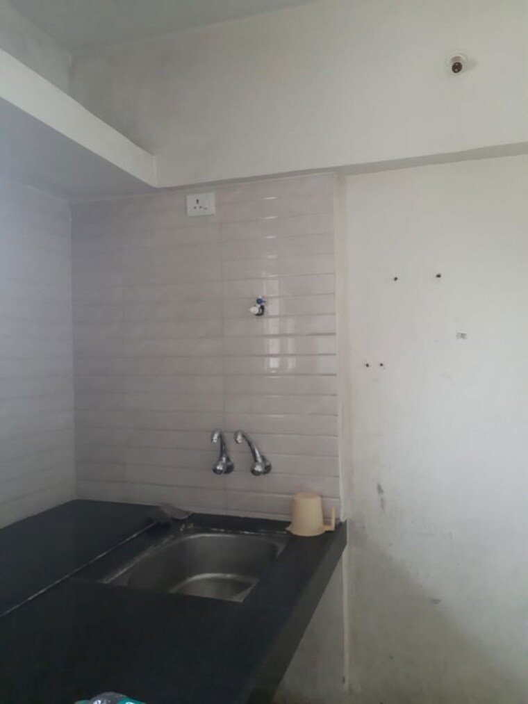 Kitchen, six-wishes 1 Bedroom 550 Sq.Ft. Apartment In Talegaon Dabhade Pune 9788082