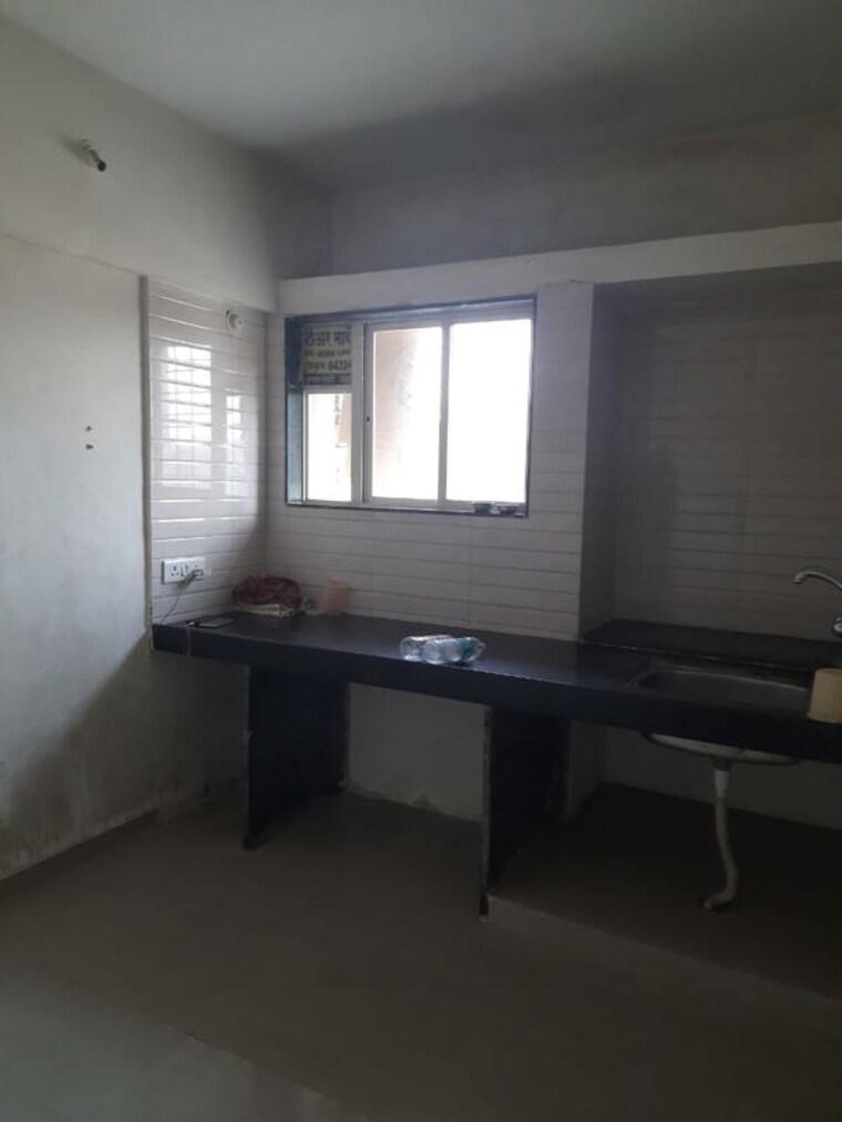 Kitchen, six-wishes 1 Bedroom 550 Sq.Ft. Apartment In Talegaon Dabhade Pune 9788082