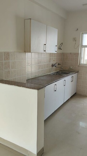 Kitchen in 3 BHK Apartment at Shree Vardhman Victoria, Sector 70 – for Rent