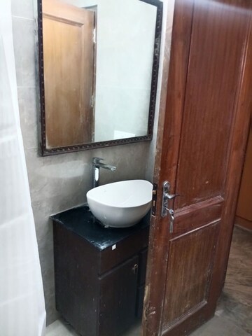 Bathroom in 3 BHK Apartment at RWA Apartments Sector 26, Sector 26 – for Rent